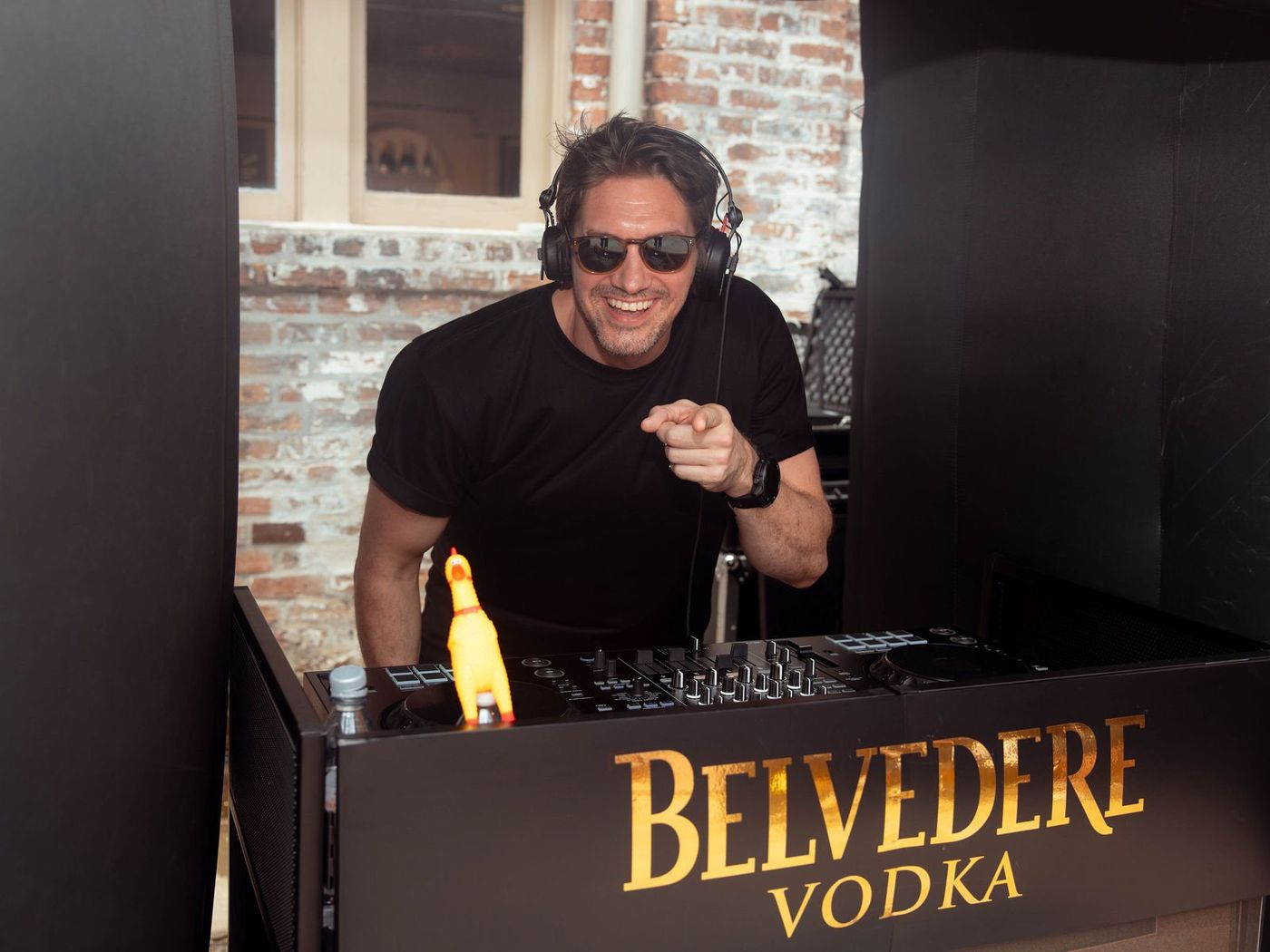 The DJ at the Belvedere desk inside the boombox